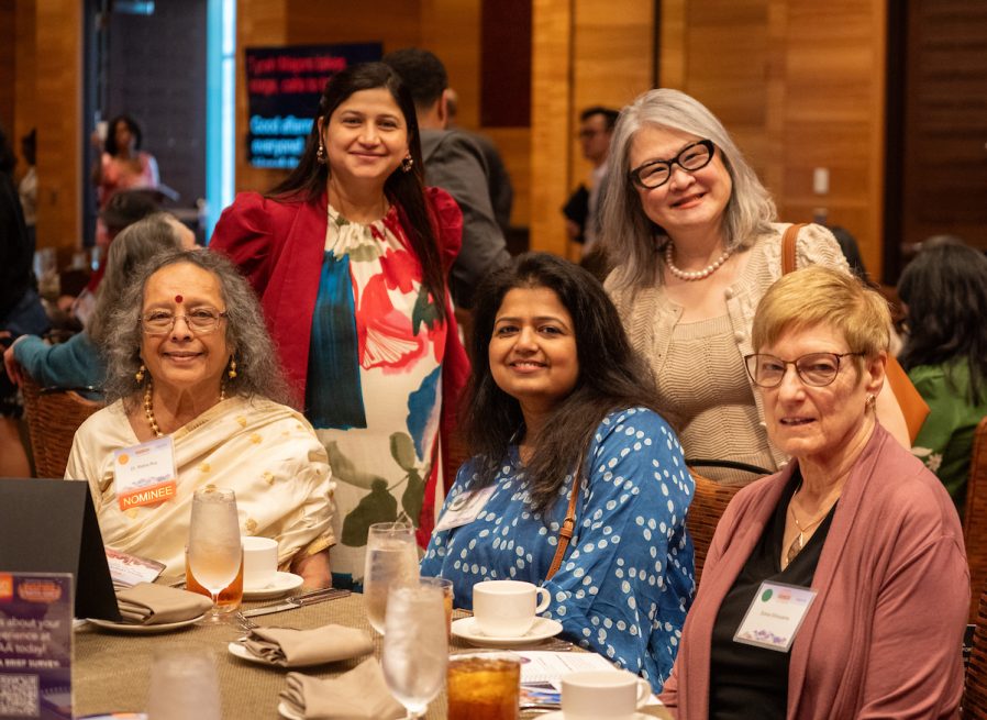 a group of people smiling