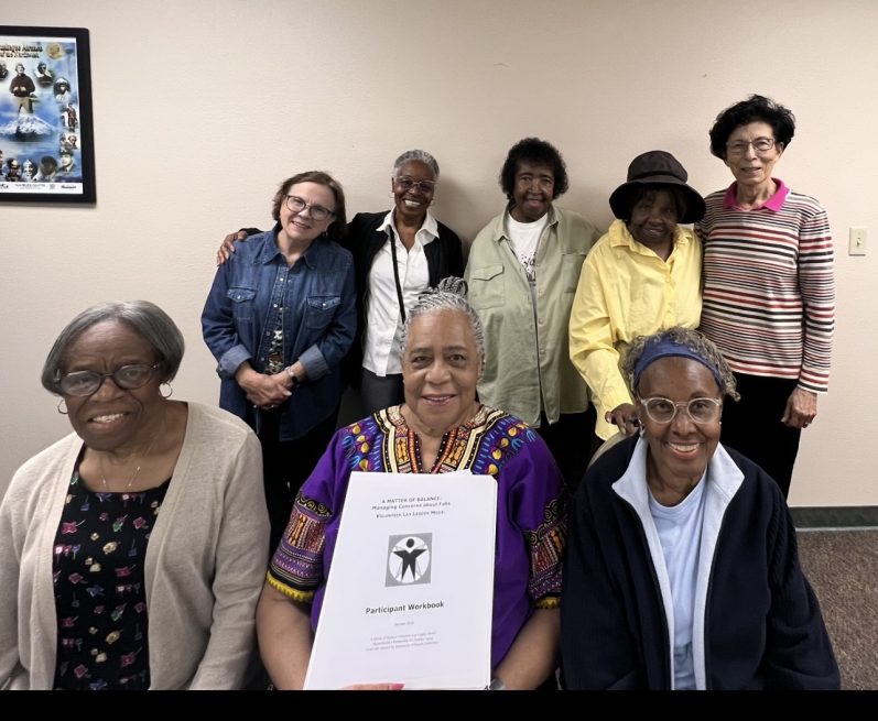Photo of 8 members and coaches of a Matter of Balance class. smiling and posing together with the Matter of Balance workbook Matter of Balance is a fall prevention workshop with classes throughout King County Washington, during which participants learn strategies that build confidence, strength, and agility to help reduce fall risk through Sound Generations programs.
